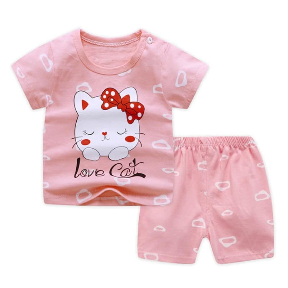 Pyjama deux pièces t-shirt et short motif chat en coton rose porté à la mode