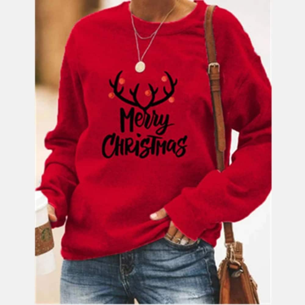 Pull à manches longues et col rond pour femme rouge avec motif licorne "Merry christmas" porté par une femme à la mode