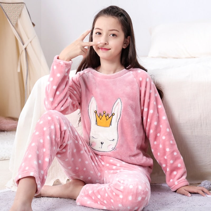 Pyjama polaire chaud pour fille porté par une fille à la mode, très haute qualité