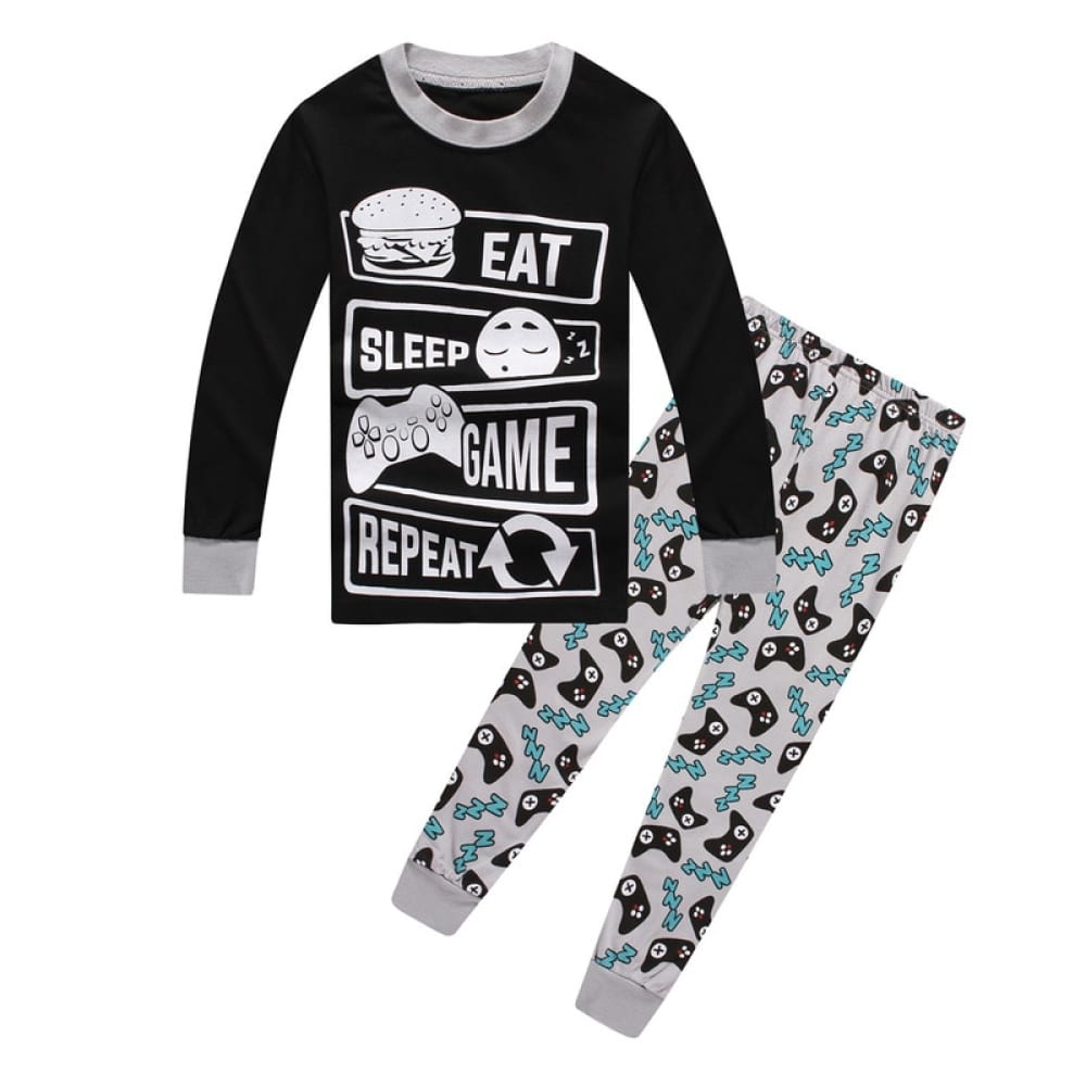 Pyjama pour les passionnés de jeux-vidéos noir et gris avec un fond blanc